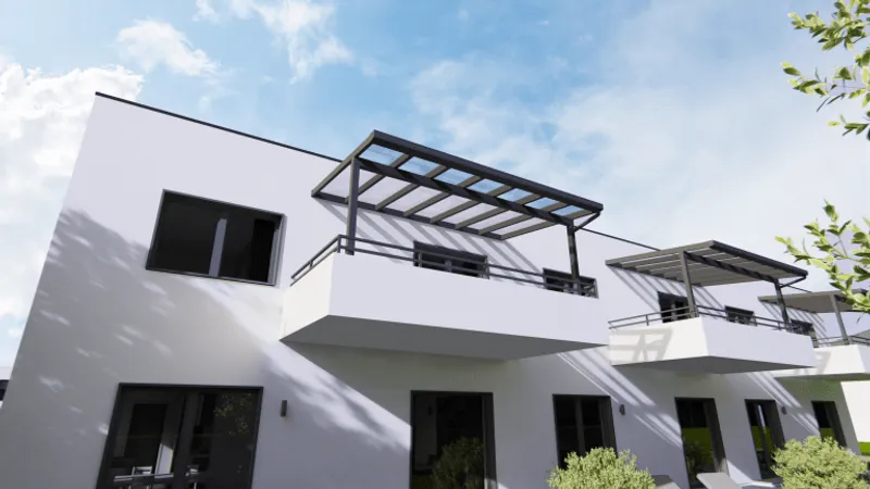 Balkonüberdachungen aus Aluminium an einem Mehrfamilienhaus